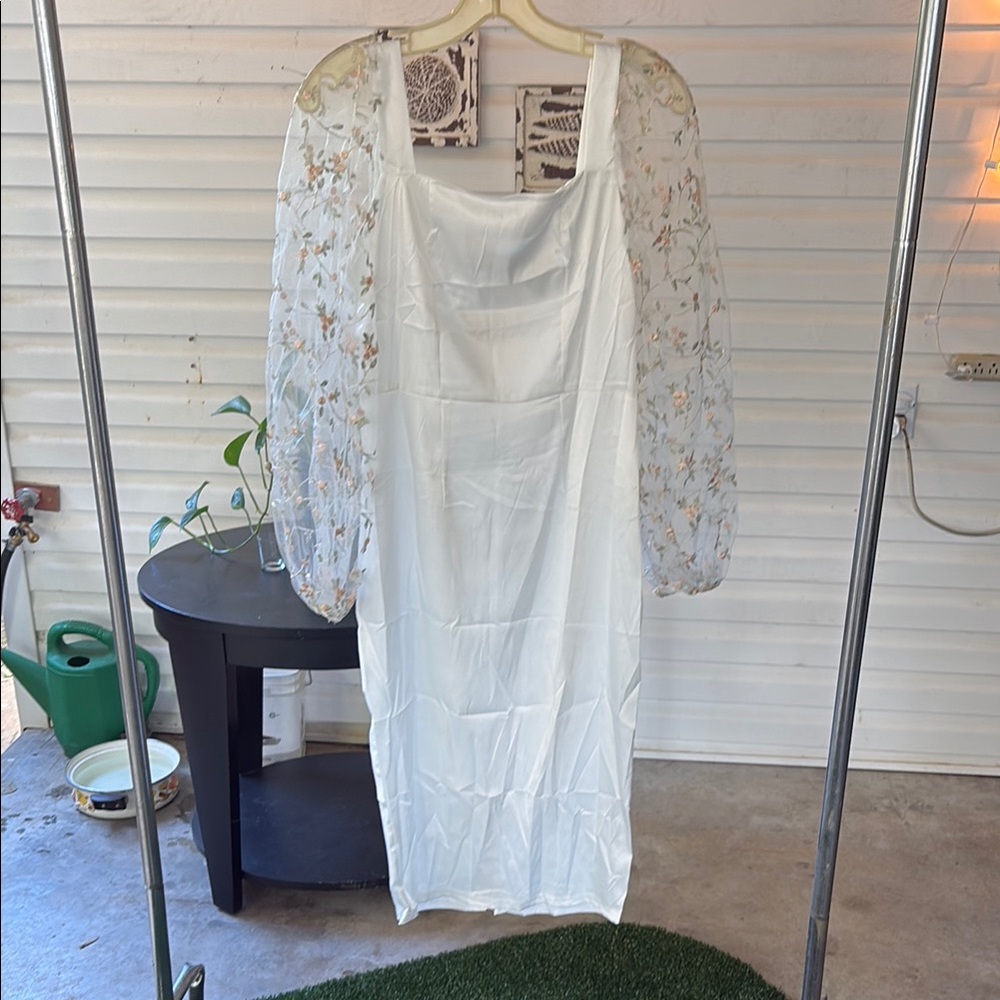 Elegant White Dress with Sheer Floral Sleeves